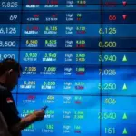 Pasar Saham Indonesia Bergolak: Dividen CTRA, Divestasi BUMI, Evaluasi BEI, dan Prospek AMMN Menggoda Investor